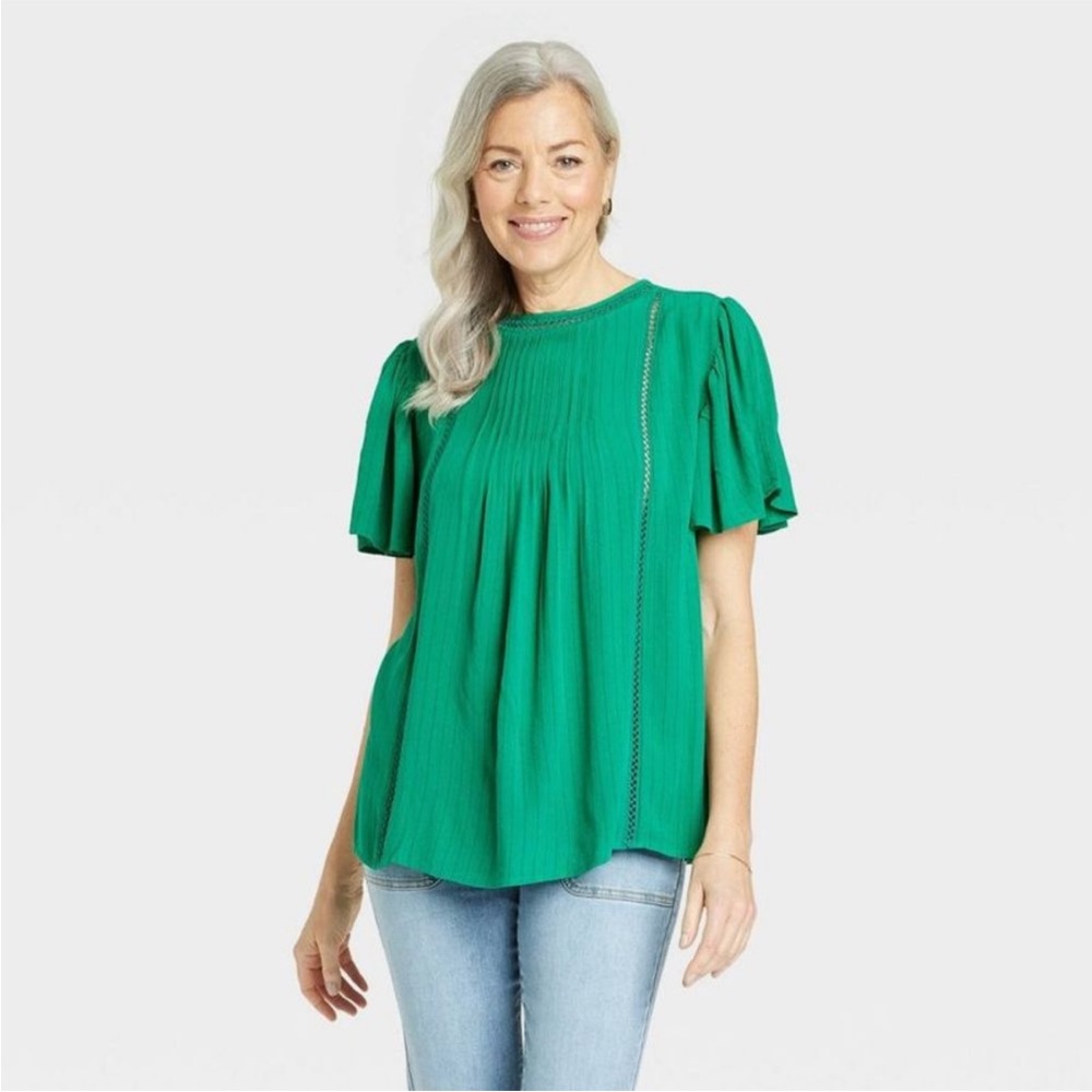 Flutter sleeve eyelet top, new, never worn.